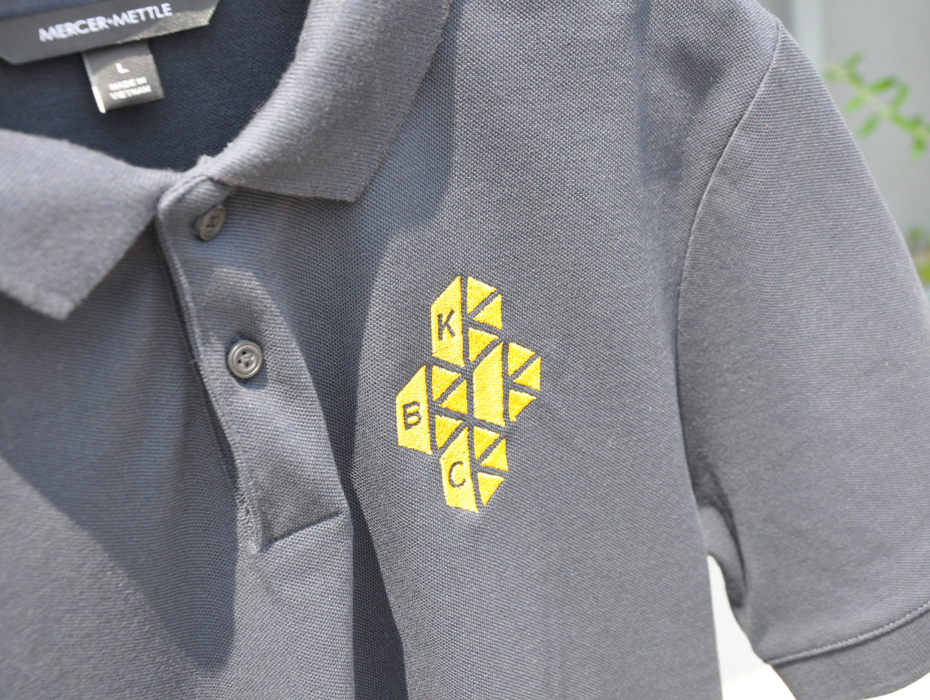 ロゴ刺繍ポロシャツ (Polo T-shirt)