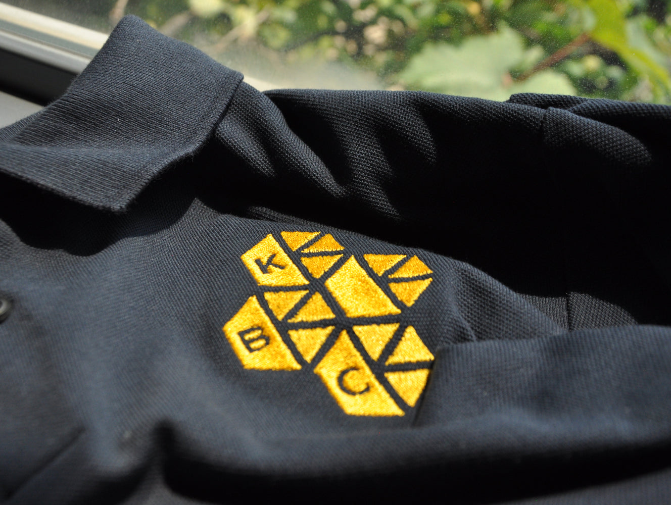 ロゴ刺繍ポロシャツ (Polo T-shirt)